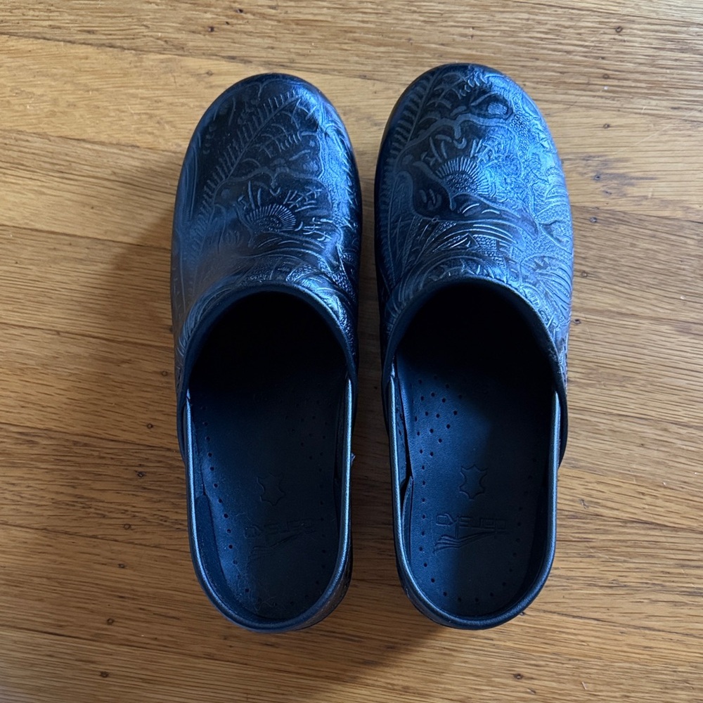 Black women’s dansko Slip-On Clogs - Embossed Pattern